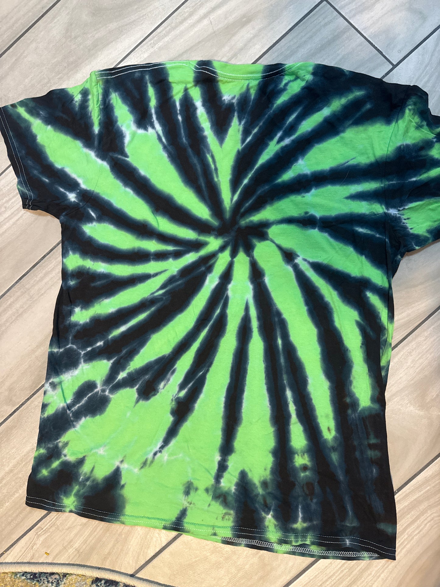 Green and black liquid spiral